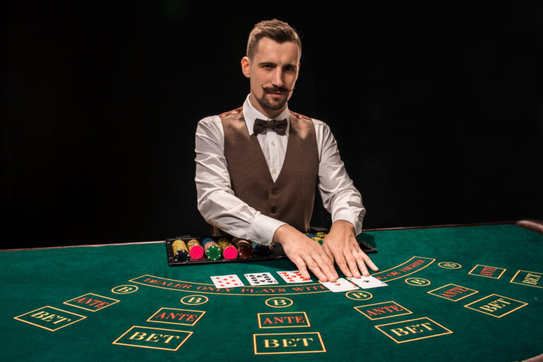croupier gambling table casino black background concept victory