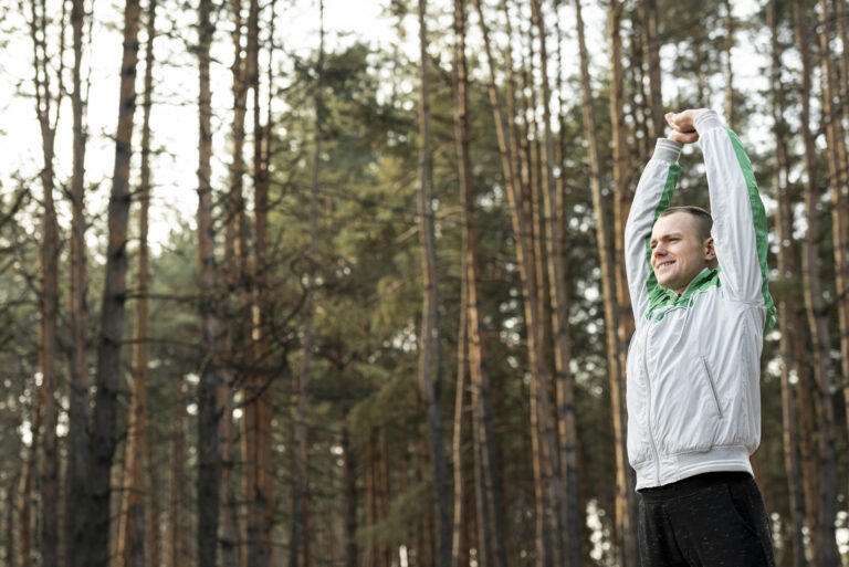 portrait man doing sport outside with copy space